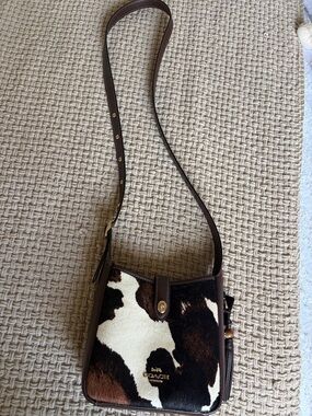 Coach Mini Crossbody Bag With Cow Print And Tassel